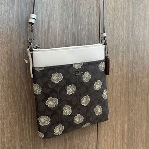 Coach Signature Rose Print Messenger
Crossbody Bag